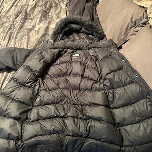 Model #CC13 Women’s The North Face Arctic Down Parka in Black, size LG.